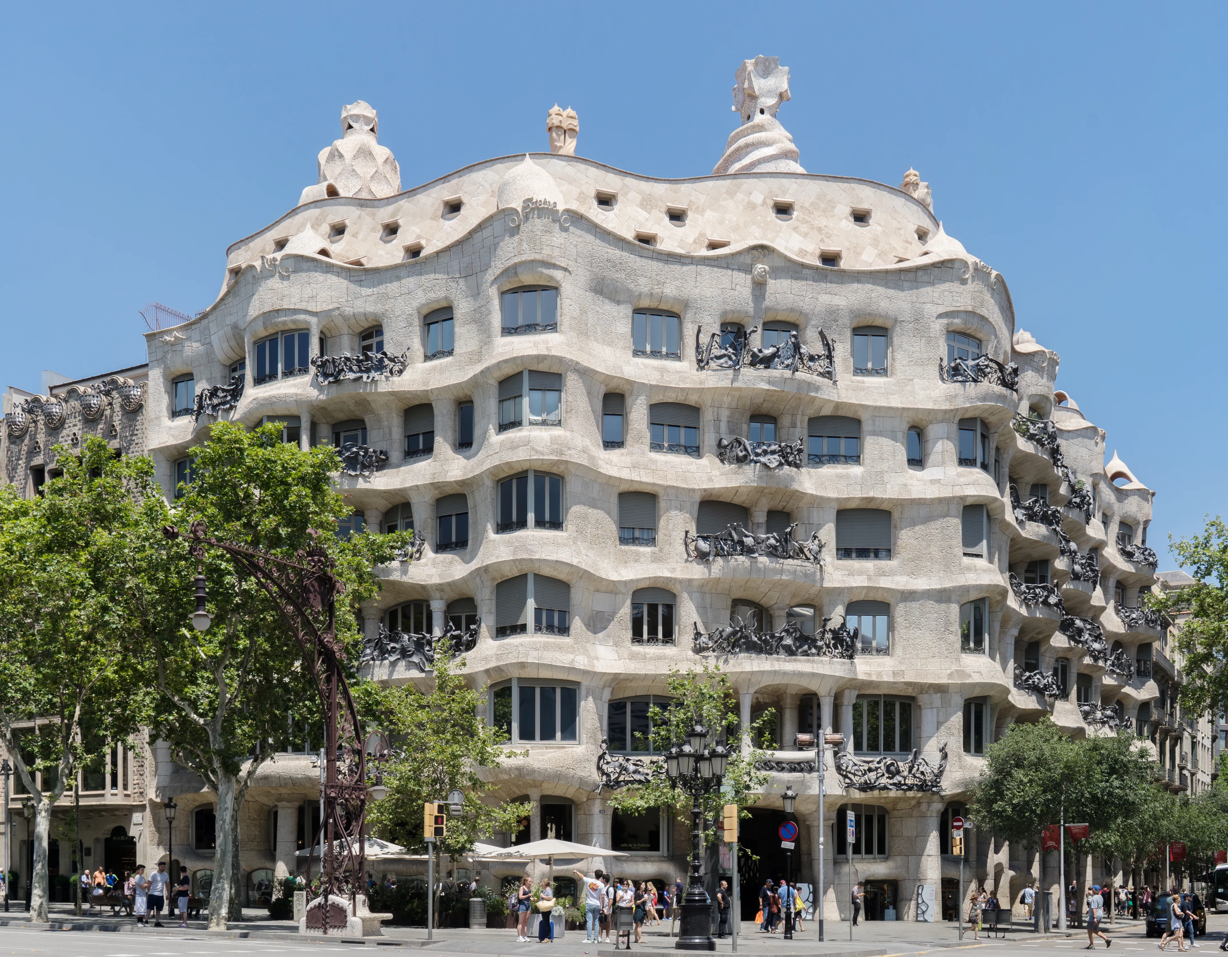 Undulating stone façade and wrought-iron balconies of La Pedrera (Casa Milà) in Barcelona